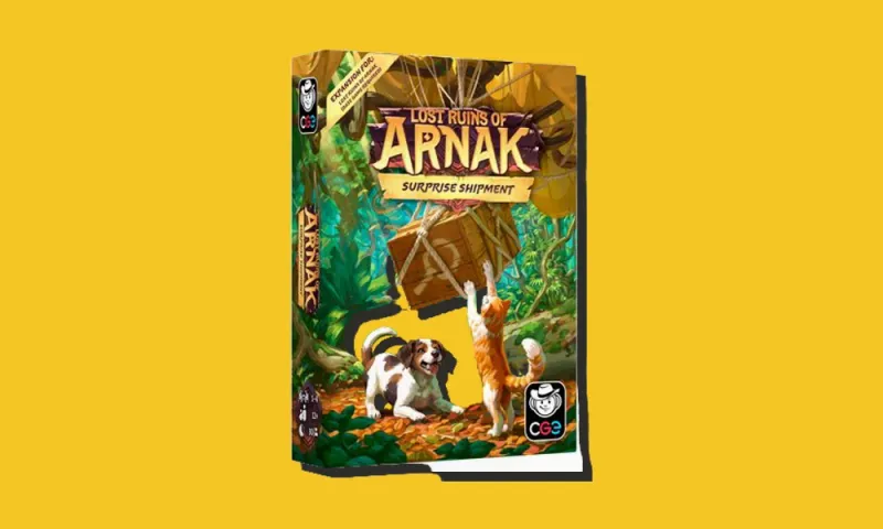 Schachtel der Arnak-Erweiterung Surprise Shipment auf gelbem Hintergrund