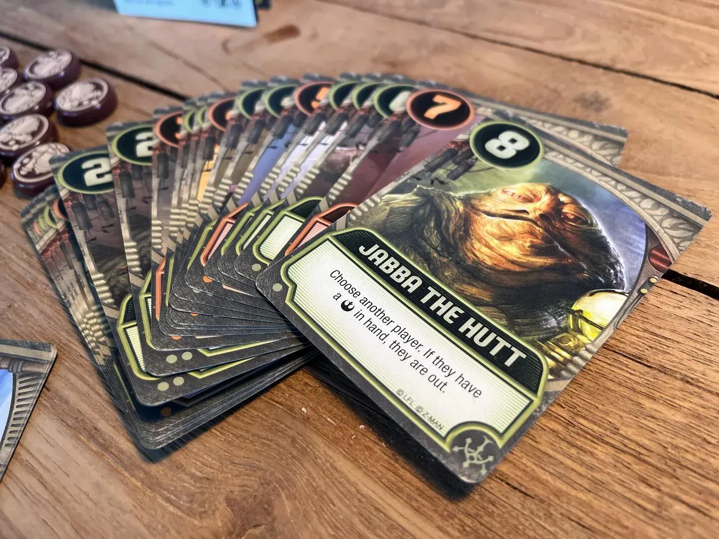 Jabba's Palace cards fanned out, with Jabba the Hutt in front