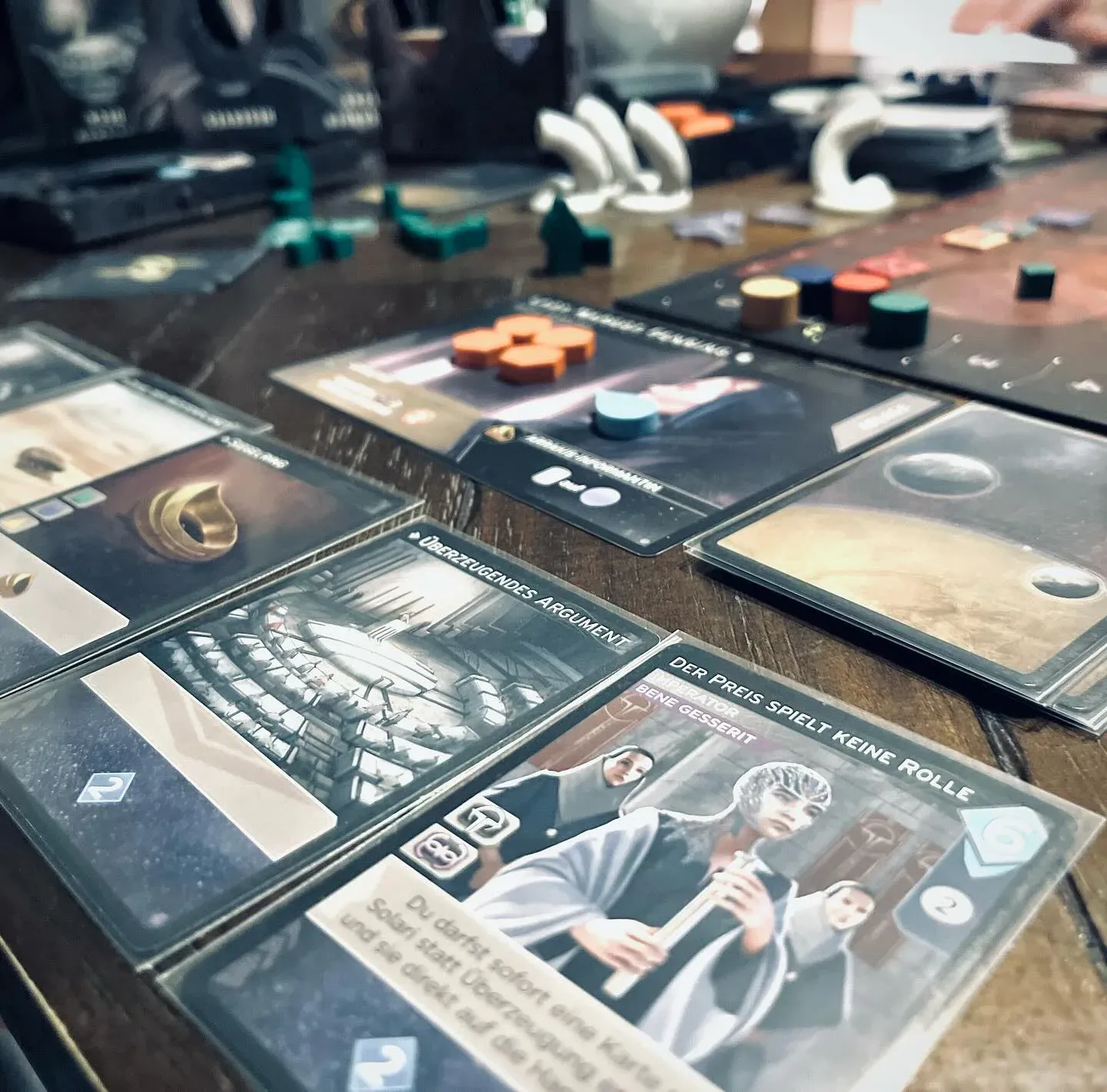 Dune: Imperium – Uprising cards and the board in the middle of a game
